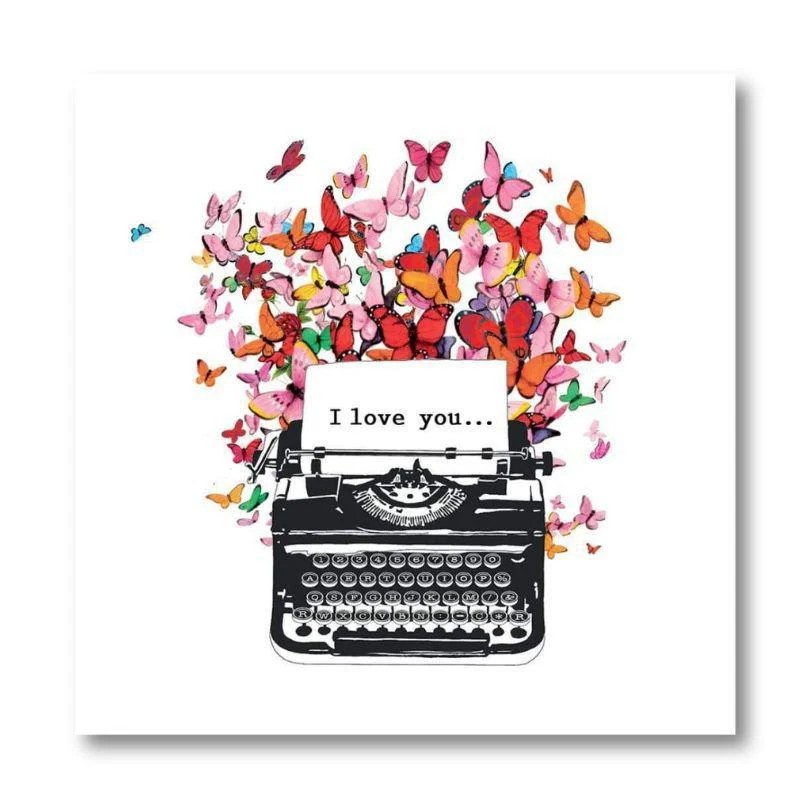 A beverage cocktail napkin featuring a black typewriter with a sheet of paper that reads 'I love you.