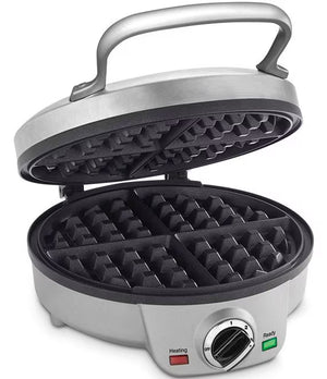 A silver and black electric waffle maker shown open on a white background, with a top handle, two rows of waffle molds, and a control dial on the front with heating and ready indicators.