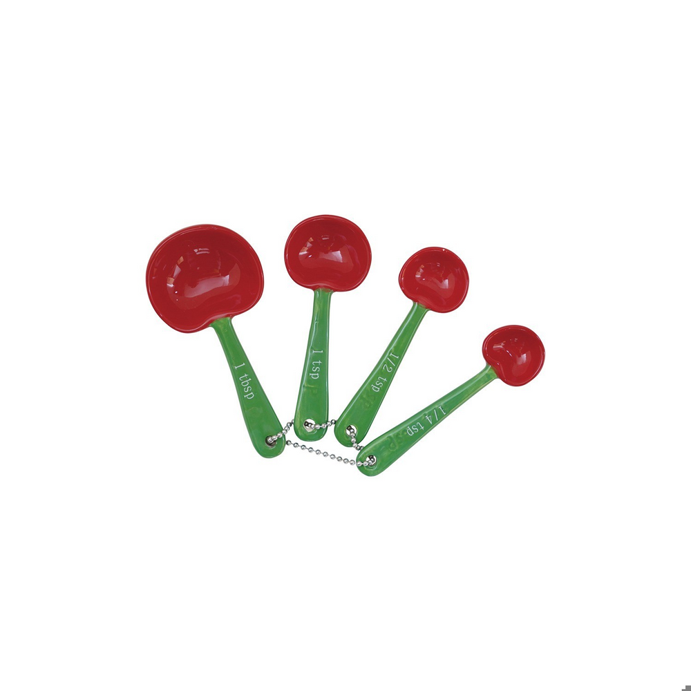 Four small cherry measuring spoons with red bowls and green handles arranged on a green and white checkered tablecloth. The handles are marked 1 tsp, 1/2 tsp, 1/3 tsp, and 1/4 tsp.