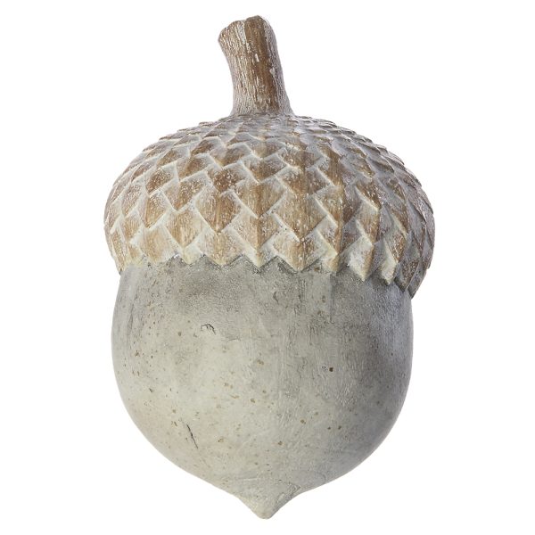 A decorative acorn sculpture with a textured, weathered gray-brown body and a lighter, patterned cap, isolated on a white background.