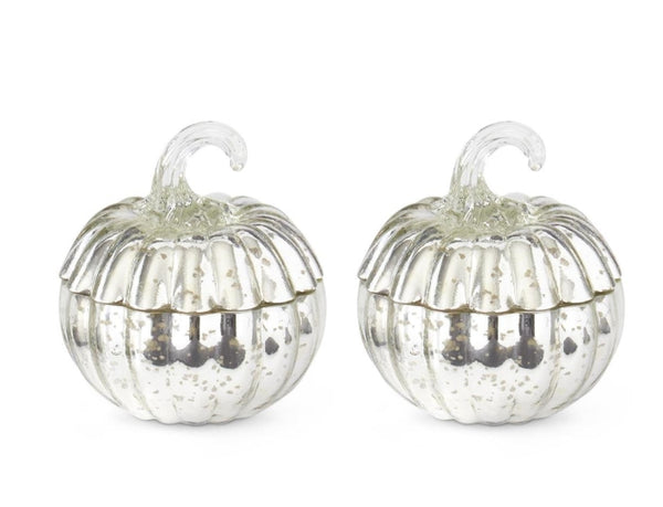 Small silver mercury glass pumpkin filled with a poured candle.
