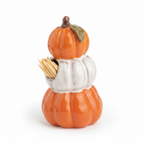 A ceramic decorative toothpick holder shaped like stacked pumpkins, with an orange top pumpkin, a white middle pumpkin, and an orange bottom pumpkin, shown on a clean white background.