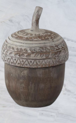 Aspen Kitchens Home+Gift resin acorn container with a decorative whitewashed lid featuring carved leaf patterns.