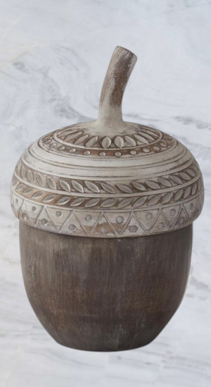 Aspen Kitchens Home+Gift resin acorn container with a decorative whitewashed lid featuring carved leaf patterns.