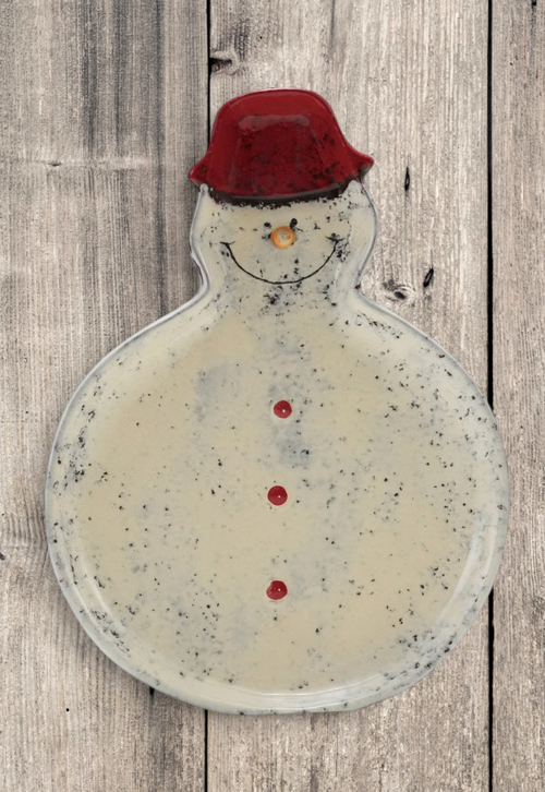 Aspen Kitchens Home+Gift hand-painted ceramic snowman dish with a red hat and reactive glaze finish for holiday decor.