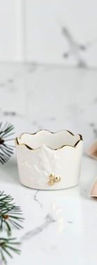 Aspen Kitchens Home+Gift stoneware tidbit bowl with white holly motif, scalloped edge, and hand-painted gold detail.
