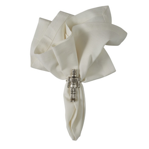 Silver nutcracker soldier napkin ring with a tall hat and detailed uniform.