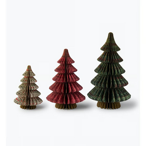 Set of three paper honeycomb Christmas trees in graduated sizes, in cream, red, and green folk-style botanical prints, on gold honeycomb bases.