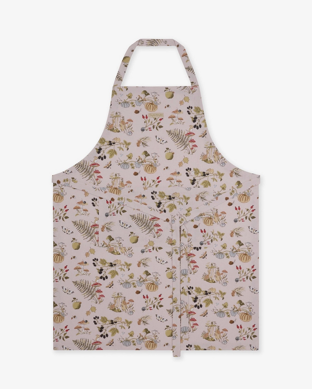 A taupe apron with an all-over autumn-themed print of pumpkins, ferns, acorns, and leaves, shown flat against a solid white background.