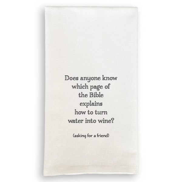 White cotton tea towel with black text reading "Does anyone know which page of the Bible explains how to turn water into wine? (asking for a friend)."