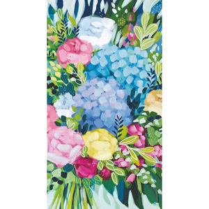 A guest towel Colorful floral design with pink, blue, and yellow flowers on a white background