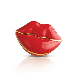 Smooches! Nora Fleming