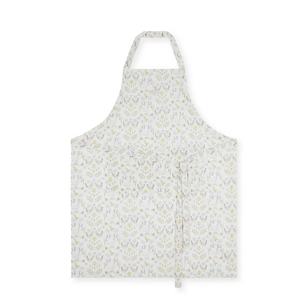 A white apron with a delicate, repeating botanical pattern in soft yellow and gray, shown flat against a solid white background.