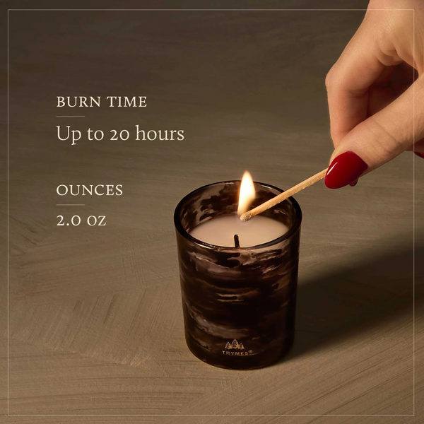 Noir Woods Votive Candle by Thymes