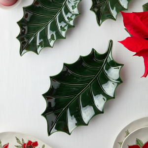 Sculpted holly leaf-shaped plate with raised leaf contours.