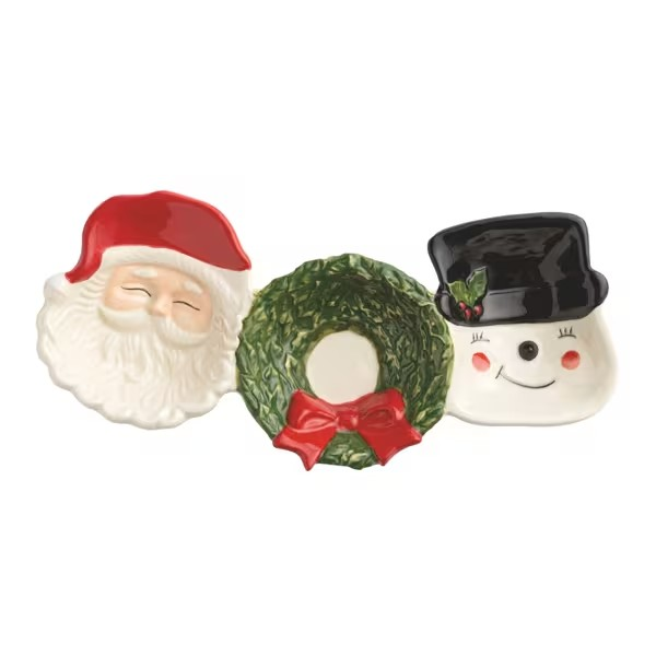 Three Christmas-themed ceramic dishes on a white background: a Santa Claus face dish, a green wreath with a red bow, and a snowman face dish wearing a black top hat.