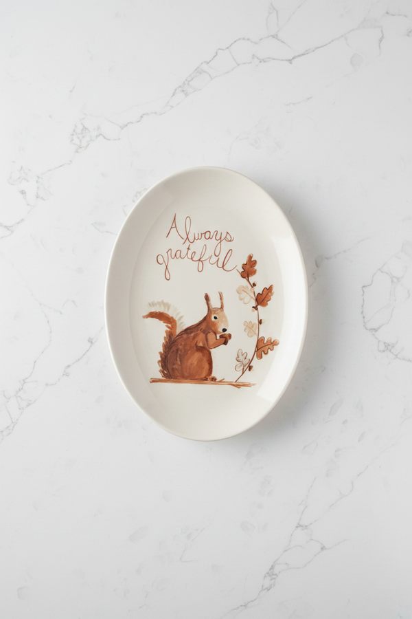 Platter witha squirrel on it, and the saying "ALways Grateful"