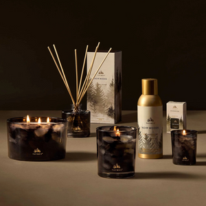 Noir Woods Votive Candle by Thymes