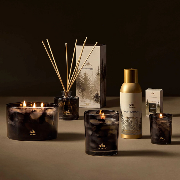 Noir Woods Votive Candle by Thymes