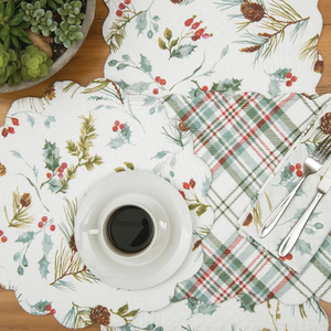 Plaid side: Round quilted placemat with scalloped edges in a white plaid with sage blue, olive green, and red stripes.

Botanical side: Round quilted placemat with scalloped edges and a watercolor pattern of holly, pine sprigs, pinecones, and red berries on white.