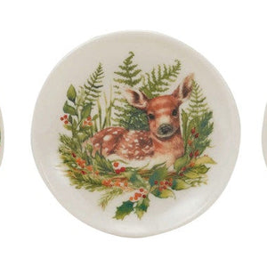 Four round ceramic coasters with animal illustrations on a white background